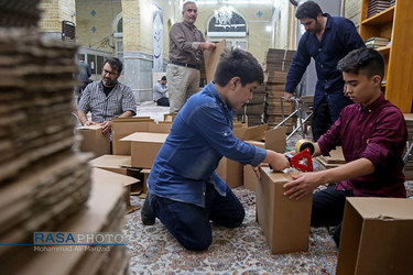 بسته بندی و توزیع ۱۵۰۰ بسته اقلام غذایی و بهداشتی در میان نیازمندان قم