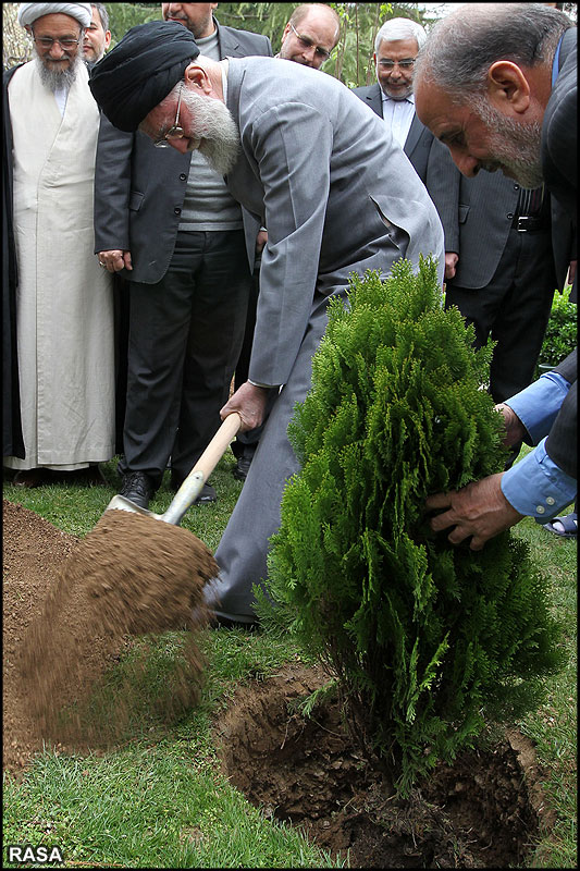 Ayatollah Khamenei Planting a seed during the National Tree day of Iran