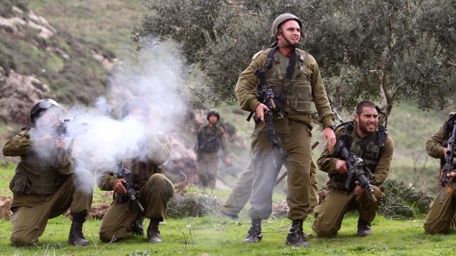 Israeli forces fire teargas