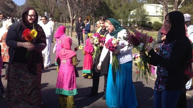 Australian Non-Muslim offering Flowers to Muslims
