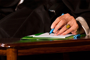 Ayatollah Khamenei writing letter