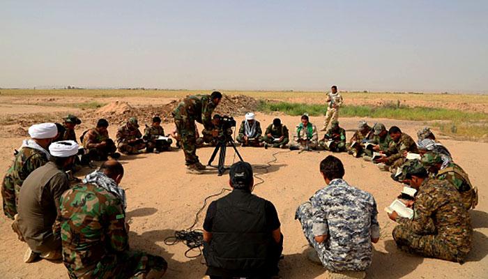 برگزاري مراسم قرآني در مناطق جنگي عراق