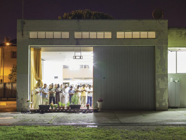 Italian Muslims praying in carparks