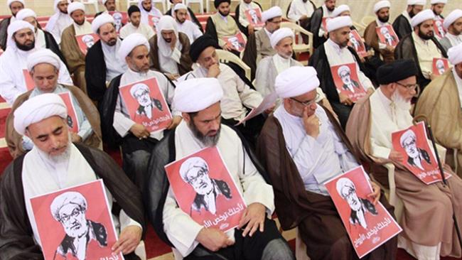 Supporters of leading Bahraini Shia Muslim cleric Ayatollah Qasim stage a gathering in Bahrain on July ۲۳, ۲۰۱۶