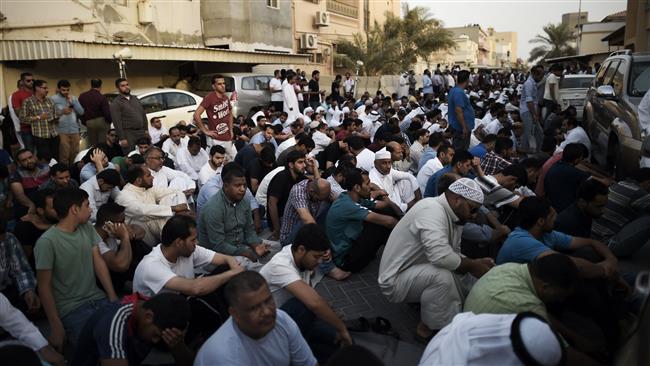 Bahraini demonstrators protest against the revocation of the citizenship of top Shia cleric Sheikh Issa Qassim on June 20, 2016, near his house in the village of Diraz, west of Manama.