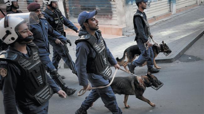 Bahraini police dispersing protesters at a demonstration by the February 14 Youth Coalition, Manama