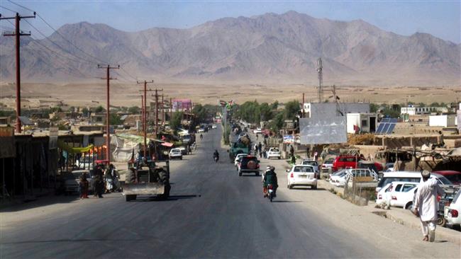 People walk in Tarin Kot, Uruzgan province, southern Afghanistan, September 8, 2016. (AFP)