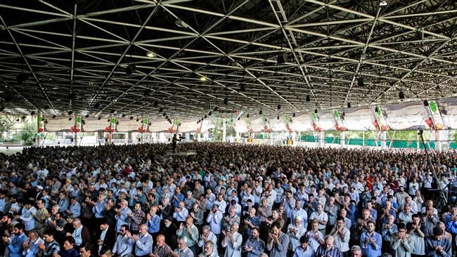 Iranians pray on Eid al-Adha, in the capital, Tehran, September 12, 2016