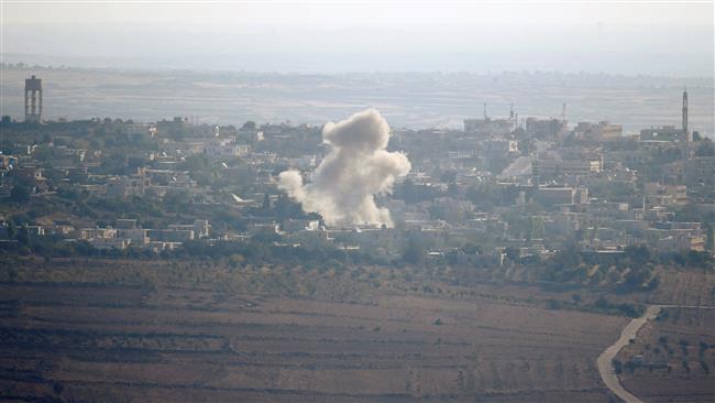 A picture taken from the Israeli-held Golan Heights on September 10, 2016 shows smoke rising from the Syrian village of Jubata al-Khashab. ©Reuters