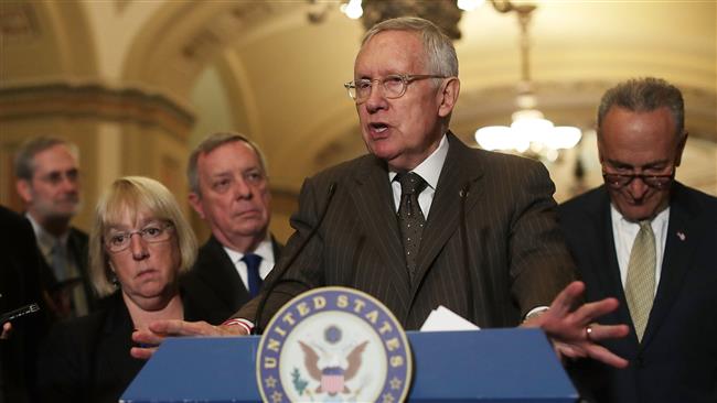 US Senate Minority Leader Senator Harry Reid (D-NV) speaks during a news briefing on July 12, 2016 at the Capitol in Washington, DC. (AFP)