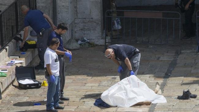 Israeli forces near the body of Jordanian national Saeed Amro at the scene of an alleged attempted stabbing attack at Damascus Gate in East Jerusalem al-Quds on September 16, 2016