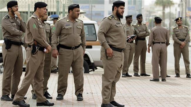 This file photo shows Saudi police officers during a patrol in the capital, Riyadh. (By AP)