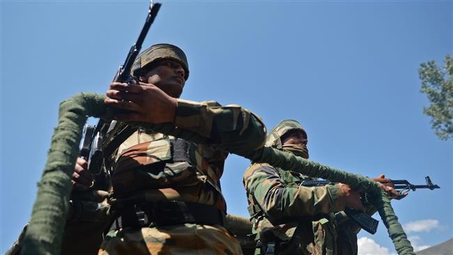 Indian soldiers are seen in the village of Bandipora, north of Srinagar, Kashmir, on September 22, 2016. (Photo by AFP)