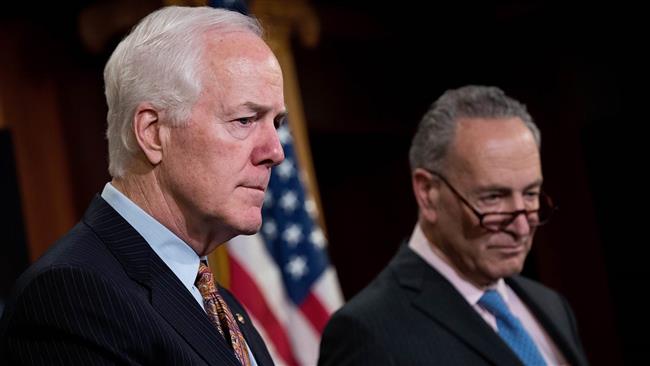 US Senators John Cornyn (L) and Chuck Schumer take questions during a news conference concerning the Justice Against Sponsors of Terrorism Act (JASTA), on Capitol Hill, May 17, 2016, in Washington, DC. (Getty images)