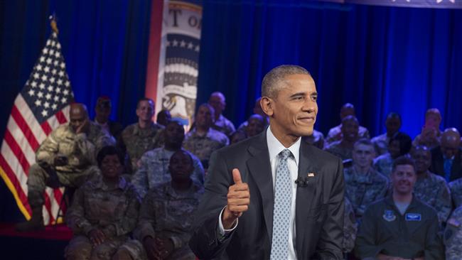 US President Barack Obama gives a thumbs-up as he participates in a CNN Town Hall meeting with Jake Tapper with members of the US Army at Fort Lee, Virginia, September 28, 2016. (Photo by AFP)