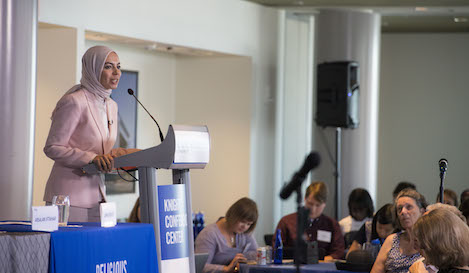 Engy Abdelkader and fellow panelists encourage journalists to improve coverage by featuring stories on daily life.