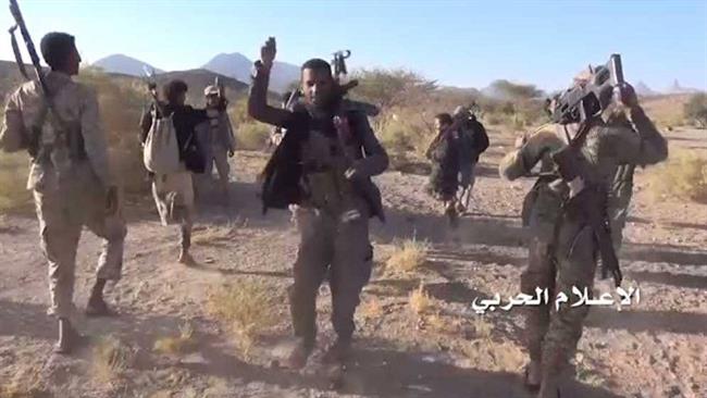 This photo, provided by the media bureau of the operations command in Yemen, shows Yemeni army soldiers and fighters from allied Popular Committees in an area in Sirwah district of Yemen’s central province of Ma