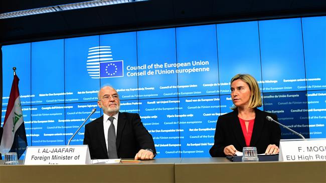 Iraqi Foreign Minister Ibrahim al-Jaafari (L) and EU foreign policy chief, Federica Mogherini, give a joint press conference at the end of an EU-Iraq Cooperation Council, at the European Council in Brussels, Belgium, October 18, 2016. (Photo by AFP)