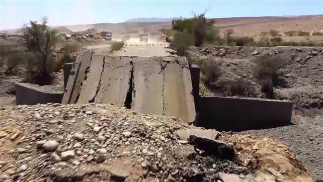 This photo shows a destroyed bridge following a Saudi airstrike in the Harf Sufyan district of the Yemeni northern province of Amran on October 20, 2016. (Photo by al-Masirah TV network)
