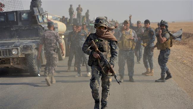Federal police forces take part in an operation against Daesh militants south of Mosul on October 26, 2016.