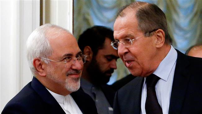 Russian Foreign Minister Sergei Lavrov (R) speaks with his Iranian counterpart Mohammad Javad Zarif during a meeting in Moscow, Russia, on October 28, 2016. (Photo by Reuters)