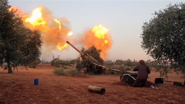 Militants fire shells towards Syria government positions on July 31, 2016.