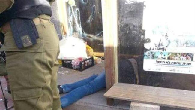 Israeli troops stand guard after they shoot dead a Palestinian near the illegal West Bank settlement of Ofra on November 03, 2016.