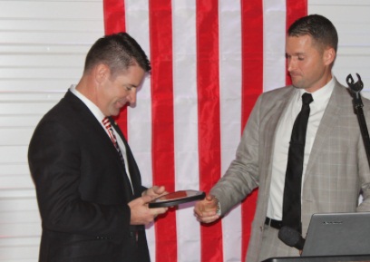 Oklahoma state representative John Bennett (left) accepts National Defender of Freedom award. (screenshot from CSP website)