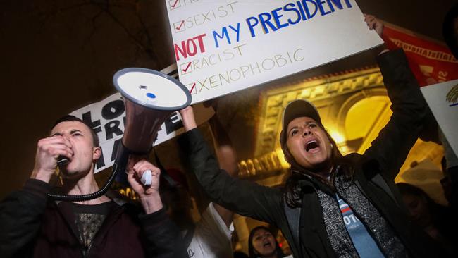 Protestors rally against president-elect Donald Trump in Union Square, November 9, 2016, in New York City.