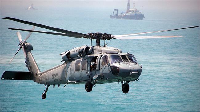 The file photo shows an MH-60 Sea Hawk helicopter