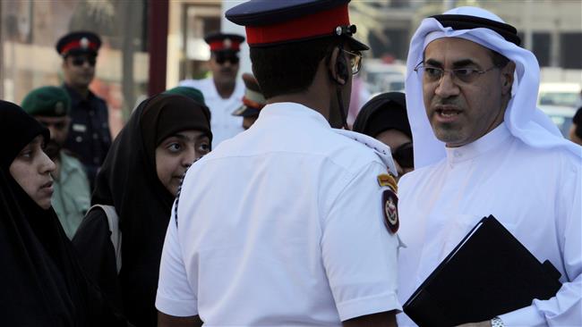 Mohamed al-Tajer (R), Bahraini human rights lawyer (Photo by AP)