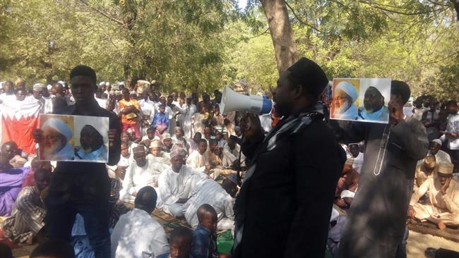 Hundreds of Nigerians attend a demonstration in support of top Bahraini Shia cleric Sheikh Isa Qassim in Kano, northern Nigeria, on December 23, 2016.