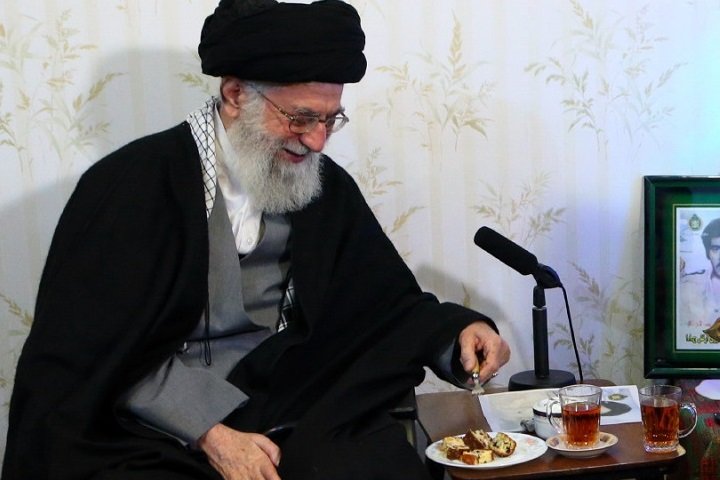 Leader expressing gratitude to Christian woman for the cake