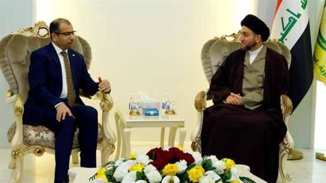 Ammar al-Hakim, the leader of the National Iraqi Alliance (INA) Shia parliamentary block (R), and Iraqi Parliament Speaker Salim al-Jabouri