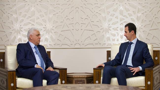 Syrian President Bashar al-Assad (R) meets with Iraqi National Security Adviser Faleh al-Fayad at the presidential palace in Damascus, Syria, on January 5, 2017. (Photo by SANA news agency)
