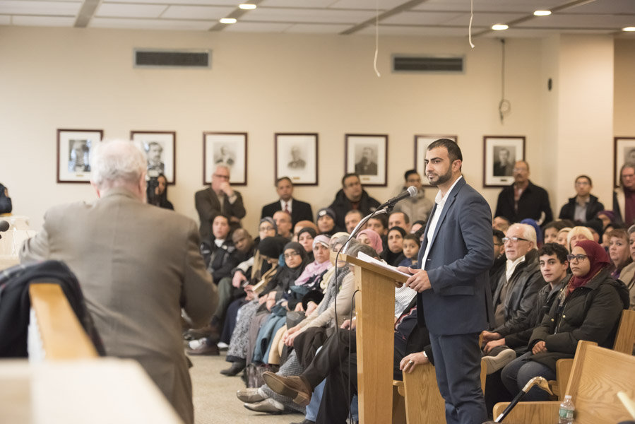 Protestors and counter protestors display opposing views on the plan for a Muslim community center in Bayonne in front of City Hall at 630 Avenue C. The Bayonne Zoning Board is expected to approve the Muslim community center at the meeting tonight. Jan.