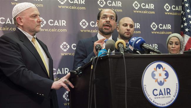 Council on American-Islamic Relations (CAIR) Executive Director Nihad Awad (2nd L) speaks alongside CAIR National Communications Director Ibrahim Hooper (L), attorney Gadeir Abbas (2nd R) and CAIR Litigation Director Lena Masri (R), about a lawsuit the organization filed against US President Donald Trump and his administration, during a press conference at CAIR Headquarters in Washington, DC, on January 30, 2017.