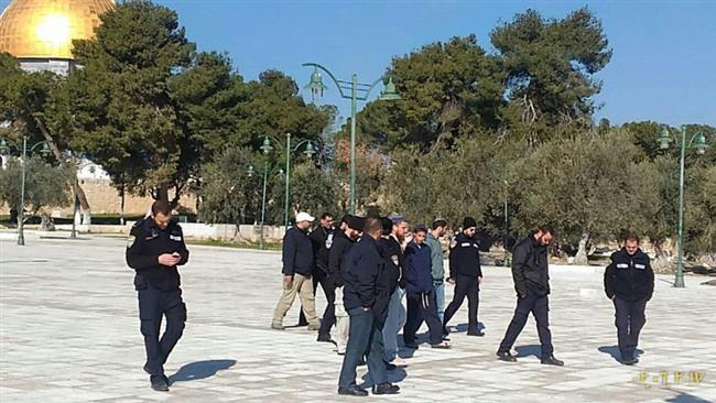 This photo provided by the Arabic-language Safa news agency shows Israeli settlers at the al-Aqsa Mosque compound in Jerusalem al-Quds on February 12, 2017.