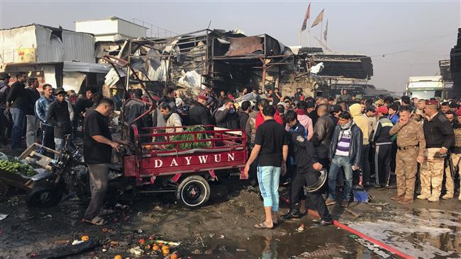 People inspect the scene after a car bomb explosion at a crowded outdoor market in Sadr City, a suburb of the Iraqi capital, Baghdad, January 8, 2017. (Photo by AP)