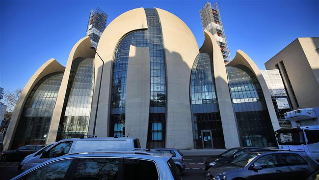 Cars drive past the DITIB mosque in Cologne, western Germany, on February 15, 2017. (Photo by AFP)