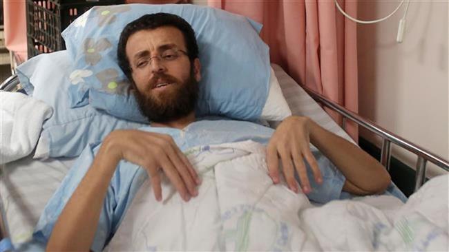 Palestinian journalist Muhammad al-Qiq on hunger strike is seen in an Israeli hospital on February 5, 2016.
