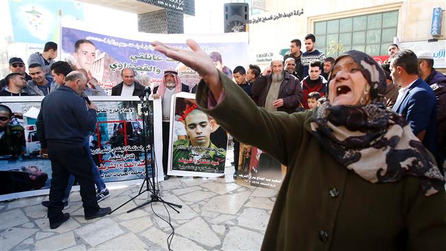 A Palestinian woman reacts during a protest following a verdict in the trial of the Israeli soldier Elor Azaria who in March 2016 shot dead a wounded Palestinian in the occupied West Bank city of Hebron, on February 21, 2017 (Photo by AFP).