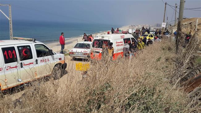 Palestinian medics gather at the site of an Israeli airstrike against a Hamas military site – known as Shuhada (Martyrs) outpost – west of Nuseirat refugee camp in central Gaza Strip on February 27, 2017