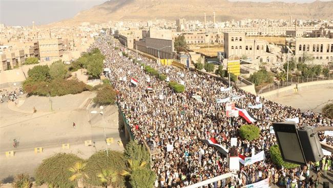 People take part in a demonstration, under the motto “Tough against Disbelievers”, in the Yemeni capital city of Sana’a on March 3, 2017 to denounce the Saudi military campaign against their country.