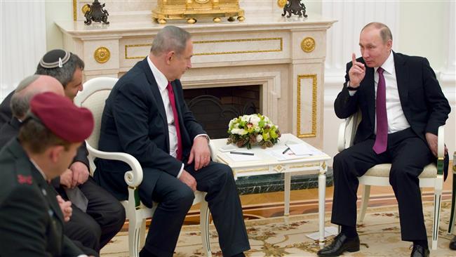 Russian President Vladimir Putin (R) speaks with Israeli Prime Minister Benjamin Netanyahu during their meeting in Moscow on March 9, 2017. (Photo by AFP)
