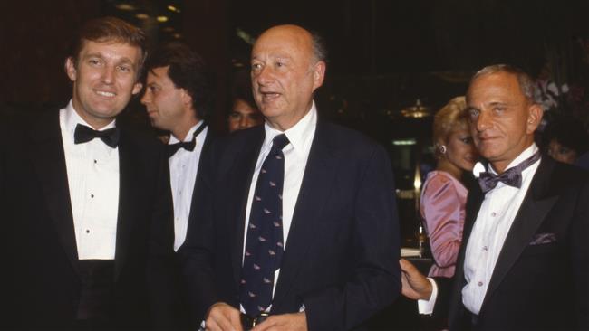 Donald Trump (left) Mayor Ed Koch (center) and Roy Cohn in 1983 at the Trump Tower opening in New York. (Photo by Getty Images)