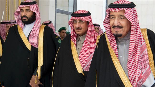 A handout picture release by Saudi Royal Palace on December 14, 2016, shows Saudi King Salman bin Abdulaziz (R), Crown Prince Mohammed bin Nayef (C) and deputy Crown Prince Mohammed bin Salman arriving for the opening session of the Shura Council in Riyadh. (Photo by AFP)