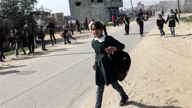 Palestinian children run for cover following an Israeli airstrike on Rafah, the southern Gaza Strip, February 27, 2017. (Photo by AFP)