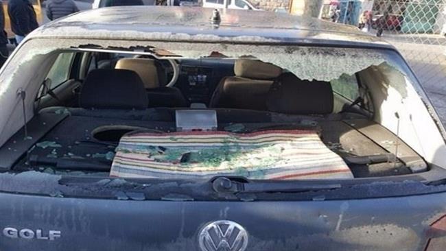 This picture taken on March 15, 2017 shows the shattered rear windshield of a car following skirmishes between Israeli military forces and local residents at Dheisheh refugee camp in the occupied West Bank. (Photo by Ma’an news agency)