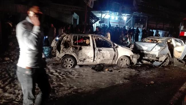 Destroyed cars are seen at the site of a car bomb attack in the Hay al-Amil district in the Iraqi capital of Baghdad on March 20, 2017. (Photo by Reuters)